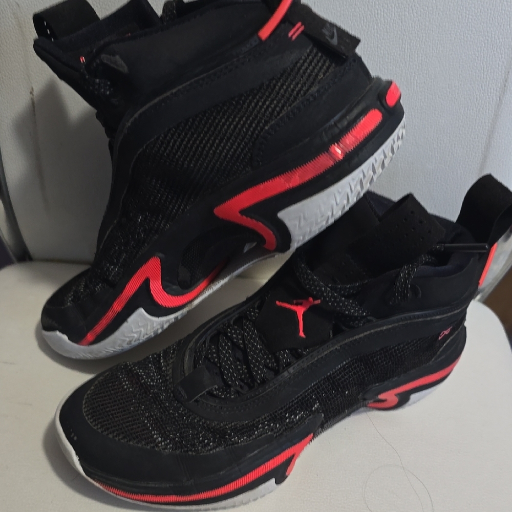 Jordan Black and Red Athletic Shoes with Jumpman Logo